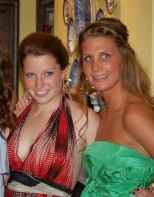 Claytie and Conley at a party, one in red, one in green